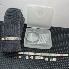 Pulsera con dos dijes elásticos italianos de acero inoxidable Zoppini con 38 dijes