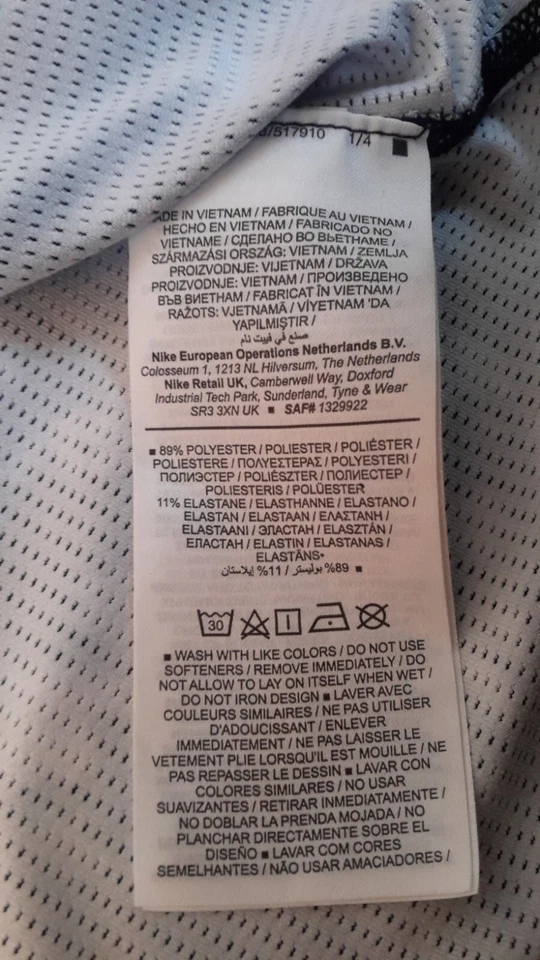 Camiseta sin mangas Nike Dri Fit ajustada para mujer M atlética negra/blanca con estampado floral Foto 4 de 4