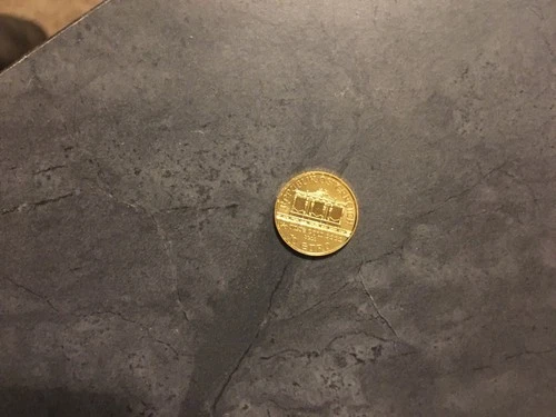 Photo of a Austrian Gold Philharmonic 1/10 oz coin from an eBay sale