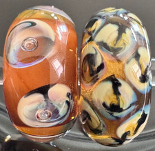 (Set di 2) Trollbeads Serling Silver Pappagallo e gatto selvatico