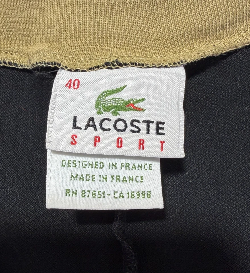 Vestido deportivo tejido Lacoste sin mangas estilo tanque negro pastel ribete en contraste tenis Foto 2 de 4