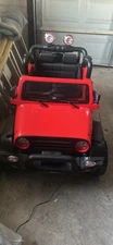 Red 12v JL-00Z ride on jeep only used once