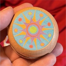Wooden Yo-Yo with Colorful Sunburst Design