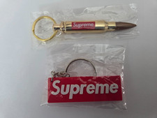 2pcs Supreme: 1 Keychain Bullet Bottle Opener and 1 3D Box Logo