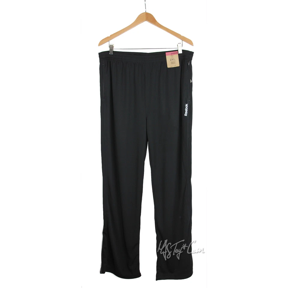 Pantalones deportivos ligeros de entrenamiento/gimnasio/correr Reebok para hombre nuevos con etiquetas precio de venta sugerido por el fabricante $40 Foto 2 de 2