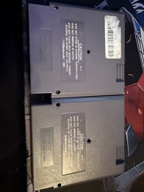 Nintendo NES hockey sobre hielo y jugar f&uacute;tbol de acci&oacute;n