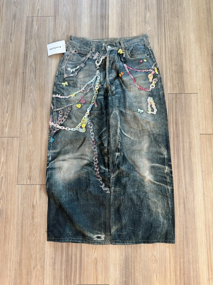 Pantalones vaqueros holgados anchos con botones estampado 3D Trompe-L’oeil estilo Y2K Acne Studios Foto 2 de 4