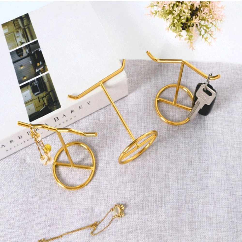 Gold metal 2024 jewelry stand