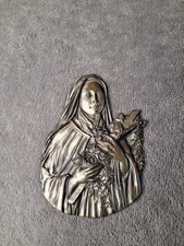 Vintage 1923 L.V. Aronson St. Theresa 6” Metal Wall Hanging Plaque Art Deco