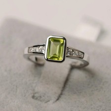 2 Ct Emerald Cut Lab-Created Green Peridot Engagement Ring 14K White Gold Plated
