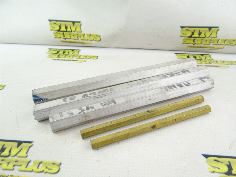3 ASSORTED PIECES OF HEX ALUMINUM STOCK & 2 PIECES OF HEX BRASS STOCK 