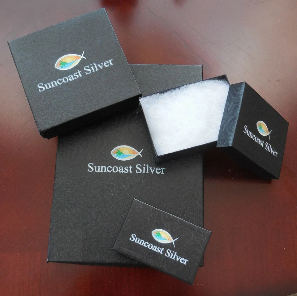 Aretes de corazón abierto de acero inoxidable 316L con ajuste de circonita roja - 1/2 pulgada Foto 4 de 4