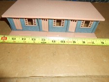 O/O-27 Bachmann Plasticville Hotel Grey sides with Pink roof.