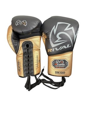 Rival RS100 Professional Sparring Boxhandschuhe schwarz/gold 18oz