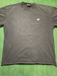 black nike shirt with white check