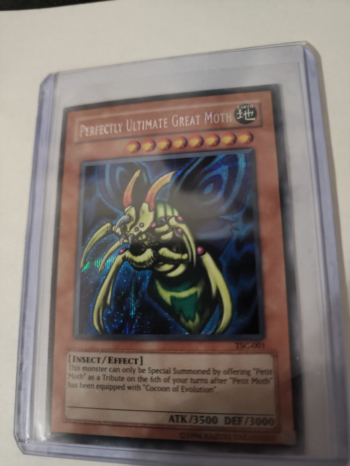 yugioh moth cards Perfectly Ultimate Great Moth - 1999 - PSA 7 - Holo - Promo