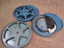 3 vintage 8mm film canisters (one empty) w/partal home movies