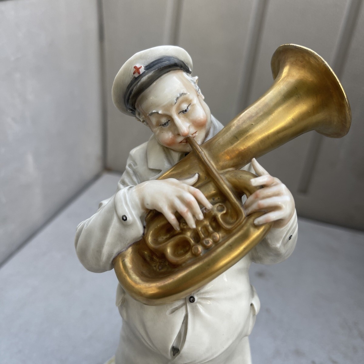 Vintage Capodimonte porcelain figure, musician playing the