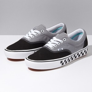 black and gray vans shoes