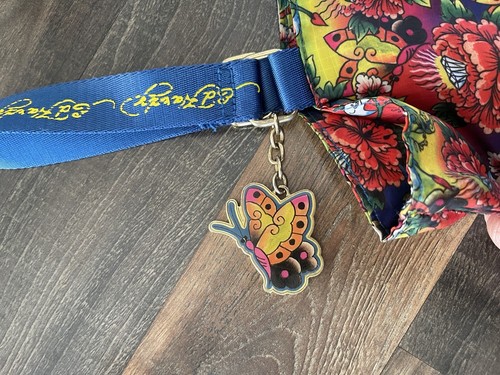 Ed Hardy Blue/Floral Nylon Tote Bag With Butterfly Charm Zipper Accents - Picture 9 of 16