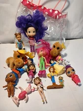 Lot Of 16 Miscellaneous Dolls w/A Disney's Minnie Mouse Clear Acrylic Purse