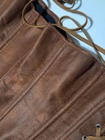 Women's corset with laces, metal hooks and flexible boning, brown.XL