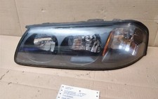 2005 Chevrolet Impala Left Side Headlight Lite Fade Top Edge 2005 Chevrolet Impala Left Side Headlight Lite Fade Top Edge