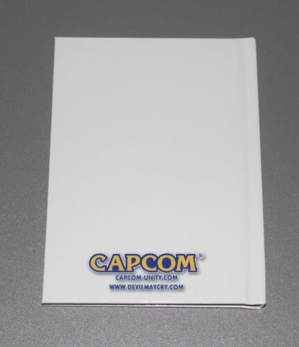 SDCC CAPCOM THE ART OF DEVIL MAY CRY 4 MINI LIBRO CON COPERTINA RIGIDA - Foto 2 di 2
