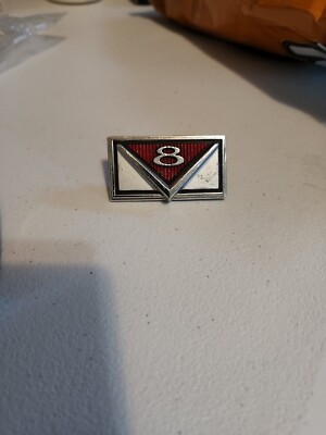 NOS 1966 Mercury Comet 202 Capri Caliente ORIGINAL FRONT GRILLE 'V8' EMBLEM