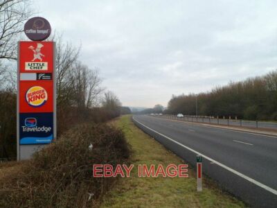 PHOTO  LIST OF BUSINESSES AT RAGLAN SERVICE STATION LOOKING EAST ALONG THE A40 F