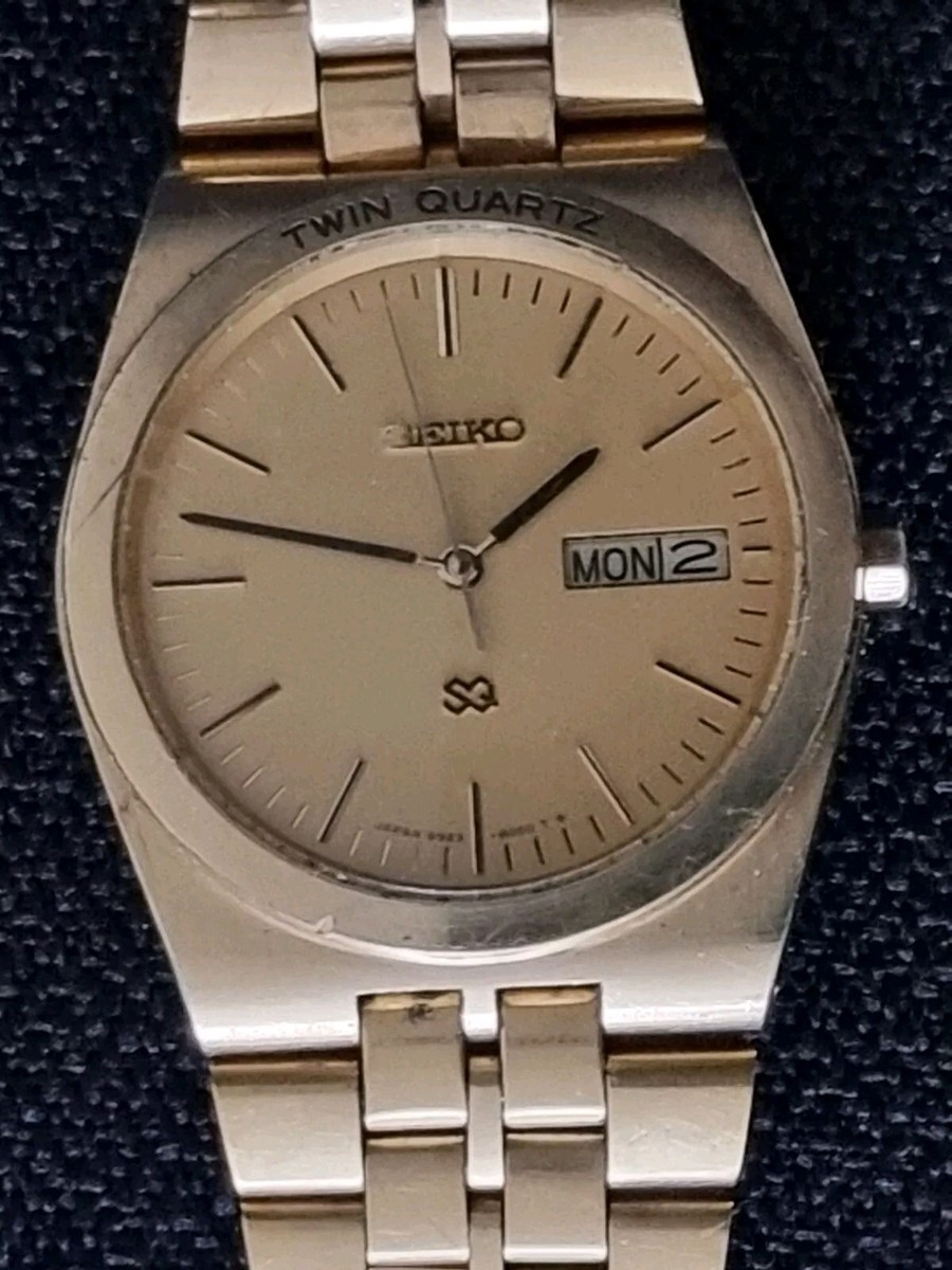 SEIKO 9923 8000 TWIN QUARTZ WATCH CHAMPAGNE GOLD DIAL SS STRAP A