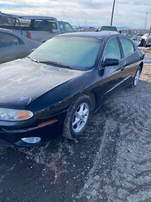 Used Left Headlight Assembly fits: 2001 Oldsmobile Aurora Left Grade A