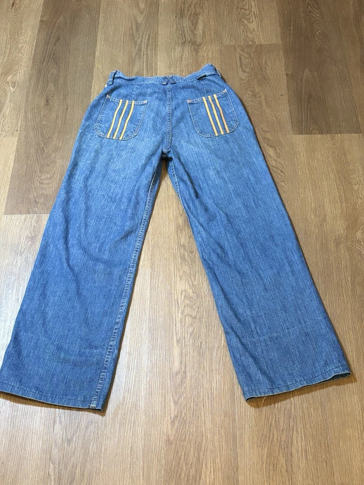 Pantalones de mezclilla acampanados vintage de los años 70 Wrangler para mujer con bolsillo a rayas amarillas  Foto 3 de 4