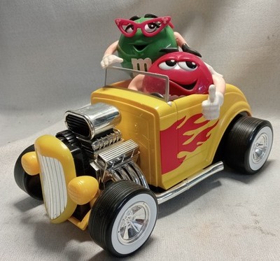 M&Ms gelber Hot Rod Auto Süßigkeitenspender Rebel ohne Ahnung 1990er Sammlerstück