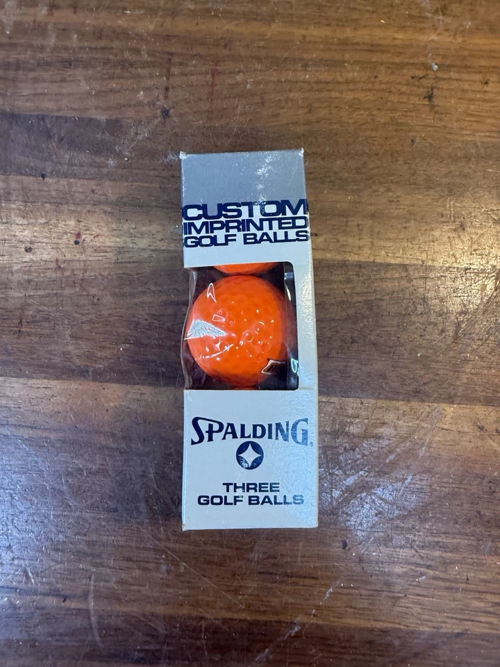 3 pelotas de golf Spalding impresas personalizadas texto “amarillo” pelotas naranja con funda de caja Foto 3 de 4