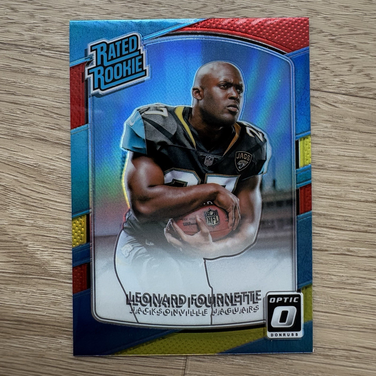 2017 Panini Donruss Optic Leonard Fournette Rated Rookie Red And Yellow #169