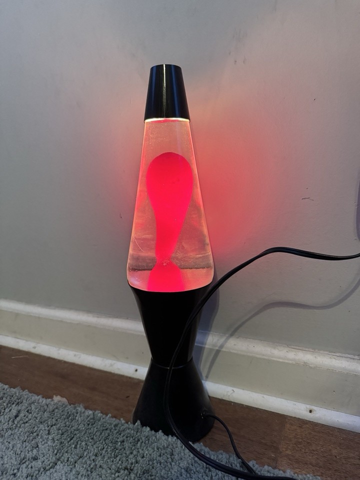 A late-90s Lava Lite Midnight Series #21 with pink wax — a specific numbered collectible series that lava lamp enthusiasts actually seek out.