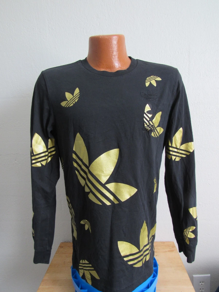 Black adidas shirt with gold on sale logo