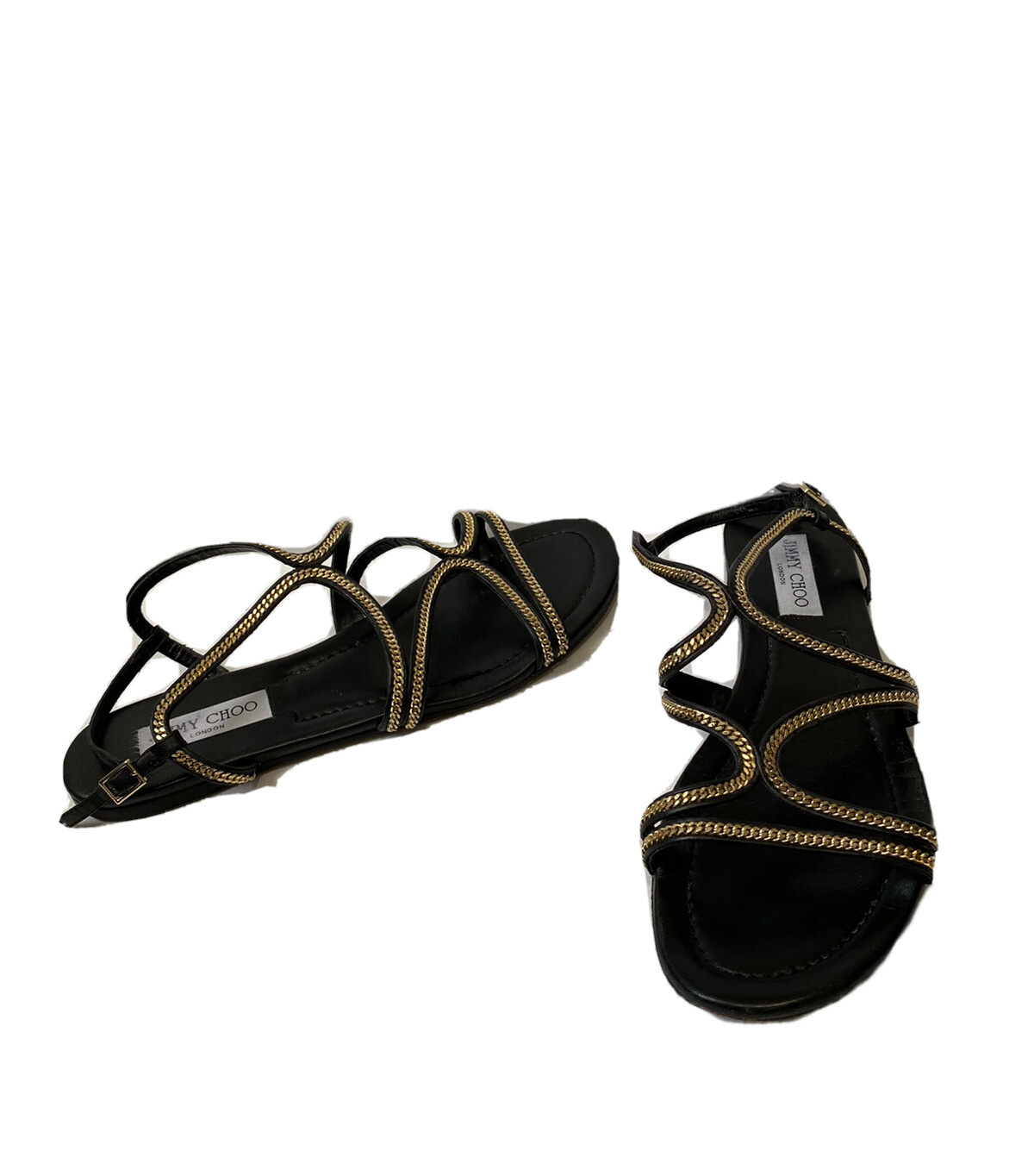 black sandals with gold trim