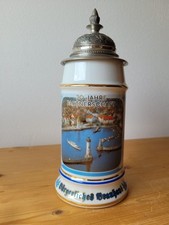 Krug mit Zinndeckel und verschiedenen Verzier...
