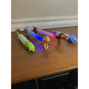 4pc LED Light Up Pop Tube Fidget Toys Animal Shark Dog Dolphin Sensory Set