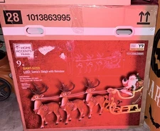 Pick up NOW! Home Depot 9 ft Giant-SizedLED Santa's Sleigh with Reindeer Holiday