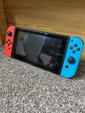 Nintendo Switch 32GB Handheld Console Neon Red & Neon Blue