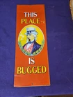 Vintage Tin Sign- This Place Is Bugged-1974-S. J. Heilner - A little rough 19x7
