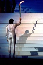 Cathy Freeman of Australia holds the torch as she prepares to ligh- Old Photo