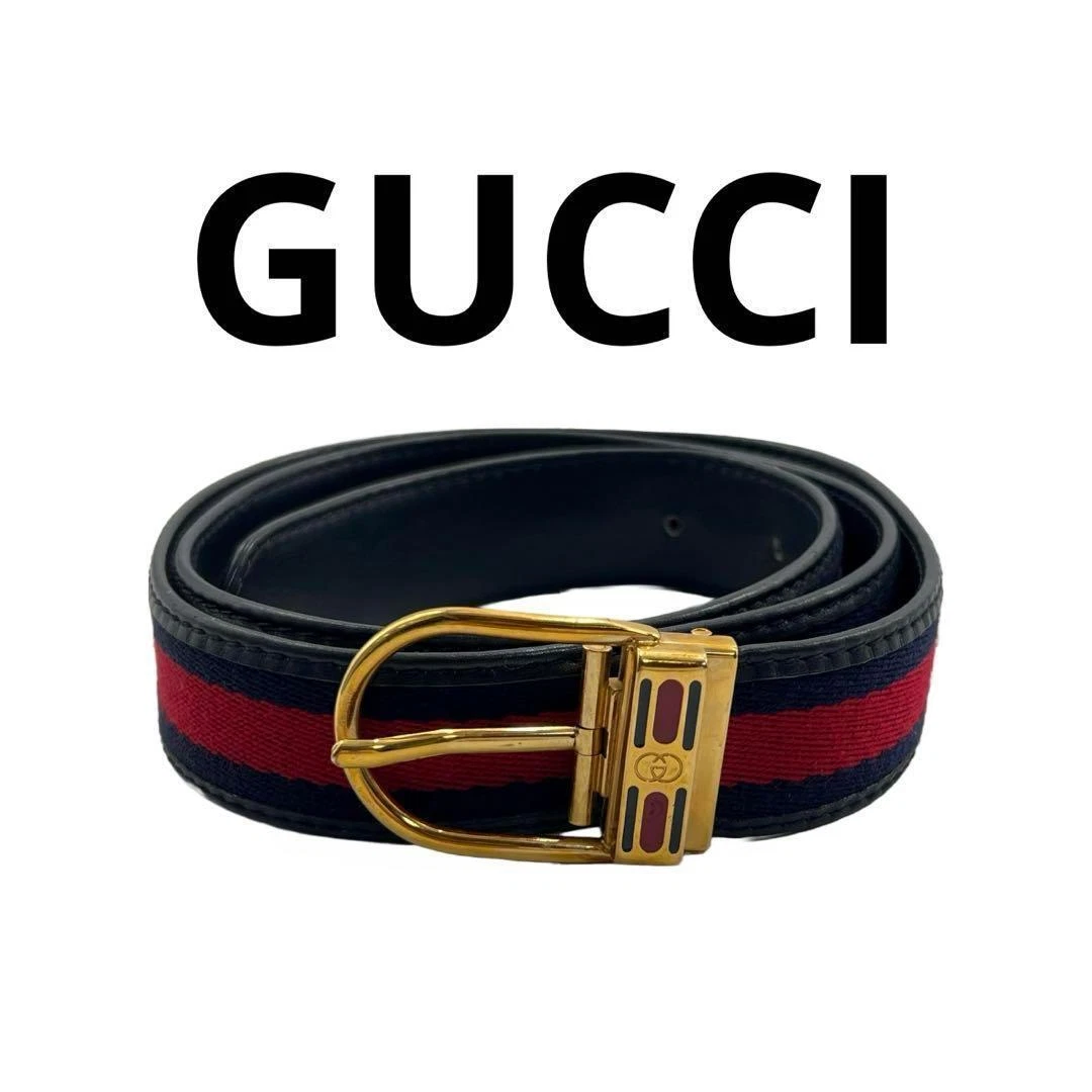 Ceinture unisexe GUCCI dorée, marine et rouge   Occasion avec bords effilochés et petites rayures