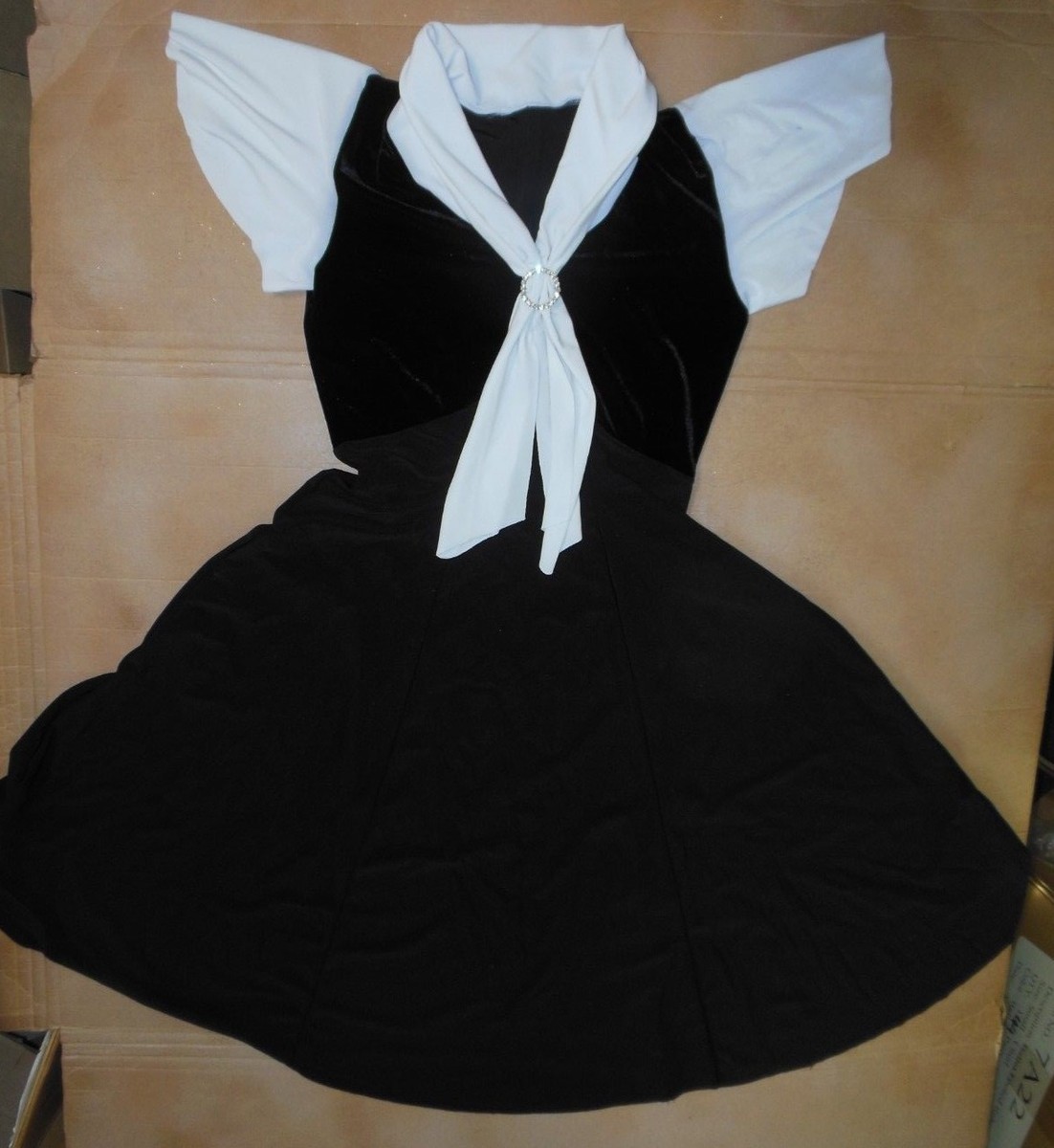 black dress with white accent Yvette