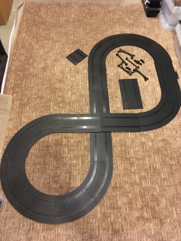 Vintage 6 inch HO gauge slot car track.
