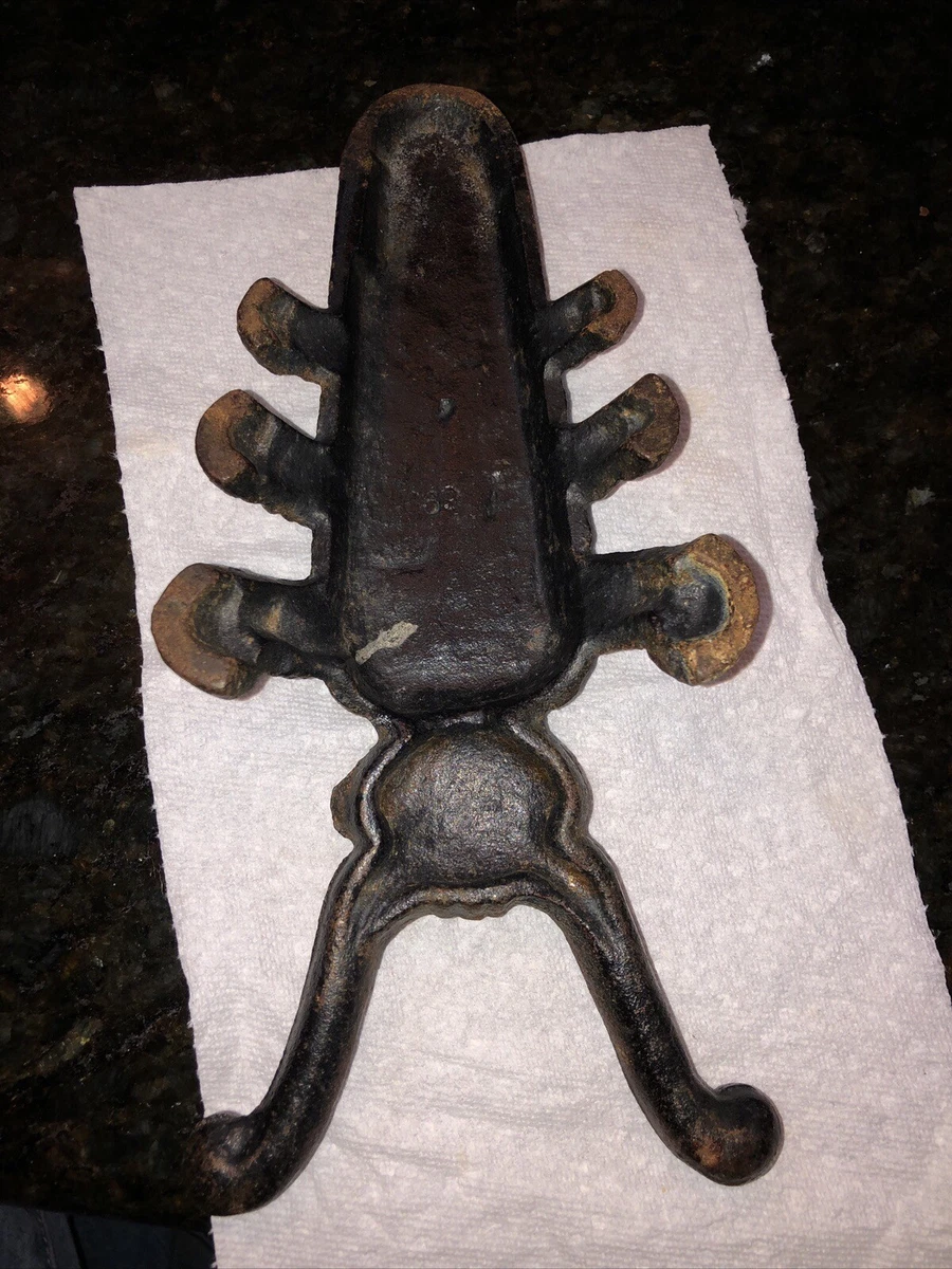 Antique cast iron beetle shop boot jack