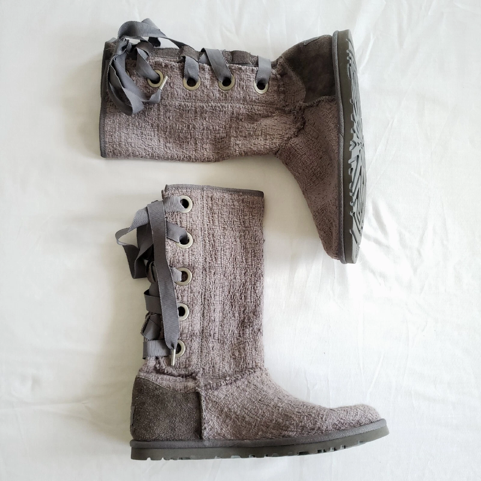 Stivali UGG Heirloom grigi stringati alti in pelle di pecora donna 7 nastri fiocchi coquette